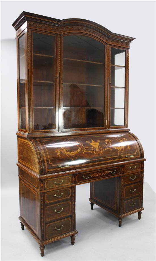 A late Victorian marquetry inlaid rosewood cylinder bureau bookcase, W.4ft 6in. D.2ft H.7ft 3in.